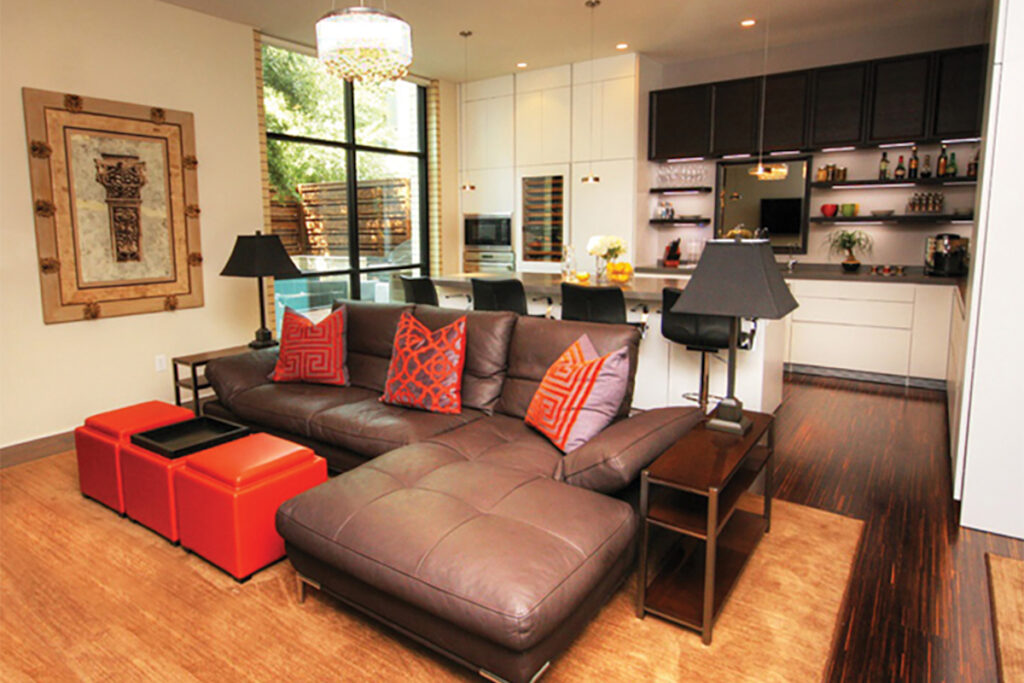 Leather sofa and bright accent pillows